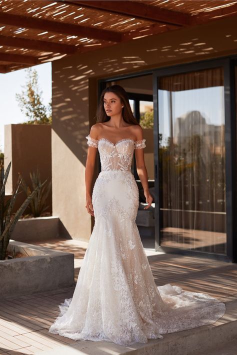 Elegant embellished off-the-shoulder mermaid wedding gown in ivory. Features a semi-transparent corset bodice, open back, and a long tulle train. Wedding Dress, Bridal Gowns Mermaid, Wedding Dresses Corset Mermaid, Wedding Dresses Mermaid Off The Shoulder, Wedding Gowns Mermaid, Off Shoulder Mermaid Dress, Strapless Wedding Dress, Off The Shoulder Mermaid Wedding Dress, Strapless Wedding Gown