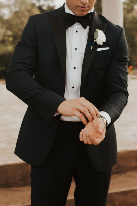 | white groom's boutonniere | bohemian groom style | classy boho groom style | formal bohemian groom style | modern groom style | traditional groom style | groom portrait ideas | groom in a black suit + black tie | wedding style | photo taken at THE SPRINGS Event Venue. follow this pin to our website for more information, or to book your free tour! SPRINGS location: Tuscany Hill in McKinney, TX photographer: Ashia Mosley Photography #groom #weddingstyle #weddingphotography #bohowedding #wedding Groom And Groomsmen, Groom Tuxedo Wedding, Groom Tuxedo, Groom Tuxedo Black, Groom Attire Black, Groom And Groomsmen Suits, Groomsmen Attire Black, Groom Wedding Attire, Groom Tux