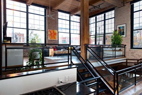 The view of the upper living area, which is actually street level. Studio, House Design, Architecture, Industrial House, Industrial Loft Design, Industrial Loft, Home Construction, Loft Design, Loft Apartment Industrial