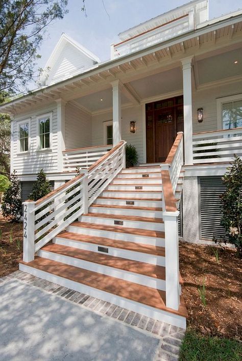I am in love with this idea. The wider stairs at the bottom then narrowing at the top leading to that gorgeous front porch! Do you have a front porch idea? If so post the picture below lets see how many different ideas we can get on here.  Ideas like this are what can make your New Construction so much fun.  Call or text me at 419-771-0215 to get more information on building your one of a kind home where we can have fun with ideas like this. Decks, Front Porch Railing Ideas, Front Porch Railings, Front Porch Steps, Porch Step Railing, Front Porch Design, Porch Stairs, Raised House Exterior, Porch Design