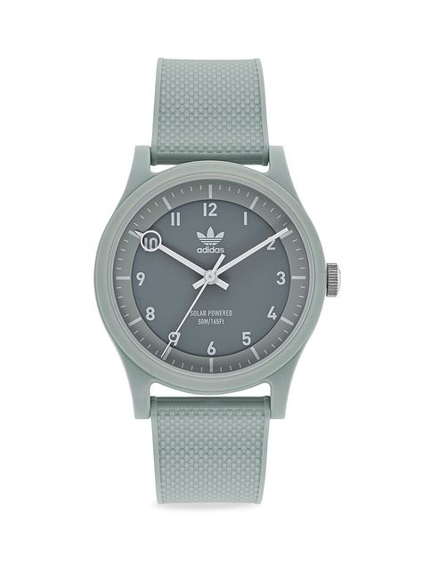 Showcasing a tonal design, this watch is mounted on a comfortable silicone strap and features a solar-powered movement. Solar-powered quartz movement Grey dial Arabic numeral hour markers Three-hand display Resin case & strap Buckle closure Model number: AOST220442I Imported SIZE Round case, 39mm (1.5"). Men Accessories - Watches And Gifts > Adidas > Saks Fifth Avenue > Barneys. adidas. Color: Grey. | adidas Project 1 Solar-Powered Resin Strap Watch Skagen, Michael Kors, Unisex, Adidas Watch, Adidas Originals, Adidas, Adidas Men, Adidas Women, Seiko