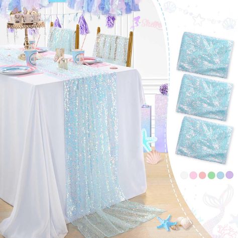 PRICES MAY VARY. Polyester Blue Table Runner Size: 3 pieces of 25 Inches width 120 Inches length(10FT long) sequin table runner. It is fits for 6-10 seats table,sparkle table runners that can meet your themed dining table decoration needs. Glitter Table Runner:The iridescent table runner is made of 5MM round sequins material with mesh fabric backing. Reliable and soft, not easy to fade, the sturdy construction makes the table runner of good durability, reusable. Wide Applications:Scales table ru Frozen Table Decor, Elsa Birthday Party Decorations, Frozen Table Decorations, Iridescent Table, Frozen Table, Glitter Table, Elsa Birthday Party, Iridescent Party, Mermaid Birthday Decorations