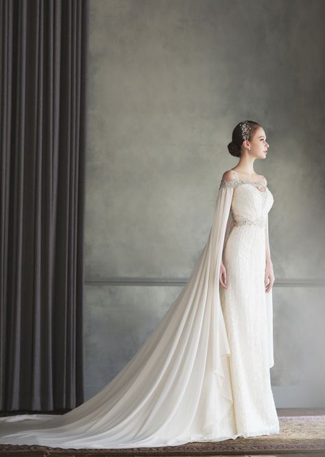 How beautiful is this Bonheur Sposa gown featuring an unique off-the-shoulder jeweled neckline and a stylish cape! Gowns, Ball Gowns, Wedding Dress, Wedding Gowns, Gown With Cape, Mermaid Wedding Dress, Gowns Dresses, Cape Wedding Dress, Bridal Gowns