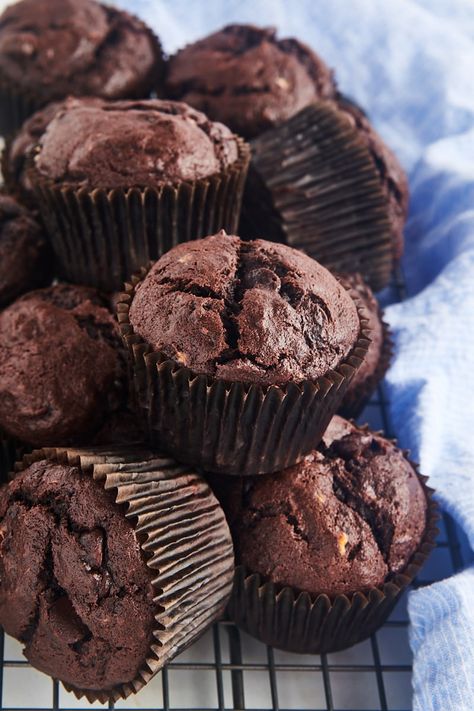 Whether you enjoy them for breakfast or dessert, you’re going to love these chocolate banana muffins! Easy to make and hard to resist, they’re loaded with rich chocolate flavor and have the moist texture of banana bread. Desserts, Muffin, Chocolate Deserts, Chocolate Muffins, Snack Cake, Chocolate Chip Muffins, Bakery Muffins, Double Chocolate Chip Muffins, Vegan Chocolate Muffins Recipe