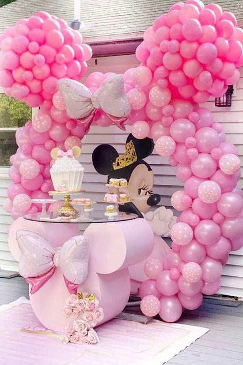 Take a look at this stunning pink Minnie Mouse birthday party! The balloon decorations are fabulous! See more party ideas and share yours at CatchMyParty.com #catchmyparty #partyideas #minniemouseparty #minniemouse #girlbirthdayparty #balloondecorations