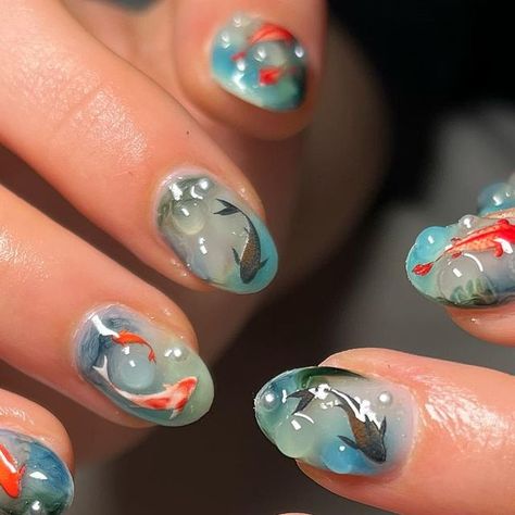J3N NAILED IT on Instagram: "💧 underwater fish nails for lovely @greta.chaparro 💧 happy birthday!!⭐️🫶🏼🎀 FREESTYLE Builder gel Blossom gel Gosh stickers Pearls 3D gel #ifitwasntj3ndothemagain DM 2 BOOK #londonnails #fulhamnails #nailsoftheday #fish #fishnails #koifish #koifishnails #seanails #swampnails #fishnailart #waternails #bluenails #seanails #aquarium #aquariumnails #fyp #explorepage #safespace #popular #bluenails #greennails #almondnails #birthdaynails #celebnails #bluenails" Nail Designs, Aquarium Nails, Jelly Nails, Fish Nails, Fish Nail Art, Water Nails, Cute Acrylic Nails, Nails Inspiration, Nail Inspo