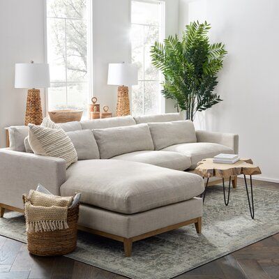 A sectional sofa with comfort and style in one high-end design features a double row of softback cushions and impeccable wood detailing. This modern sectional seats three and fits the various room and design styles. Designed with a solid oak frame, a durable and easy to clean linen blend fabric, and removable and reversible cushions, this living room sectional will last for years to come. | Joss & Main Toronto Chase Sectional Brown 35.0 x 110.0 x 74.0 in | C004866749 | Wayfair Canada Sectional Sofa With Chaise Living Room, Left Chaise Sectional Sofas, Chase Sectional Living Room, Beige Sofa With Chaise, Living Room Sectional Sofa Layout, Japandi Living Room Sectional, Chaise Longue, White Sofa With Chaise, Wayfair Couch Sectional Sofas