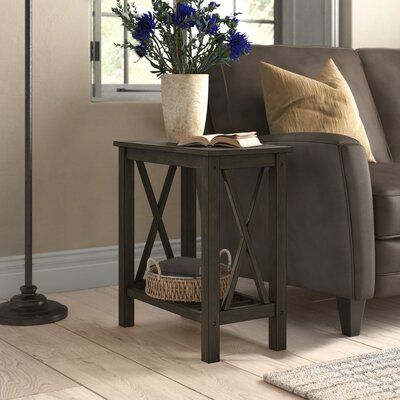 Introduce a little style and create a display space with this charming wood side table. Complete with a slatted lower shelf, the table delivers rustic farmhouse-inspired style with decorative X-braces on two sides. Its narrow profile is perfect for a small space beside a recliner or tucked into a compact bedroom. Colour: Dark Grey Home, Home Furniture, Home Décor, End Tables With Storage, Side Table Wood, Living Room End Tables, Small End Tables, End Tables, Side Table