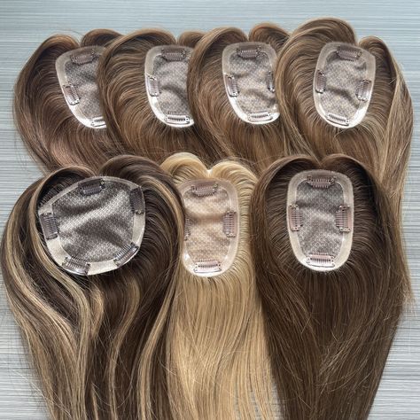It is a Premium human hair topper that features 4 non-slip, damage-free clips. The silk base allows for a comfortable wear, and mimics the scalp with invisible knotting of strands into the base. Wholesale & Flexible Customization Available. Contact us for further details now!