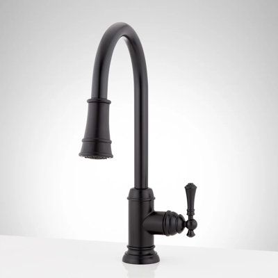 Boasting a classic look, the Amberley Single-Hole Kitchen Faucet perfectly complements traditional decor. The high-arching spout swivels 360 degrees and features a multifunction, pull-down sprayer with stream, spray, and pause settings that make dish cleaning and food prep easy. Made of durable materials, this fixture is made of solid brass with a smooth, corrosion-resistant finish. | Signature Hardware Pull Out Single Handle Kitchen Faucet w / Accessories in Black | Wayfair Kitchen Faucet Holes, Kitchen Faucets Pull Down, Single Handle Kitchen Faucet, Bar Sink Faucet, Kitchen Sink Faucets, Farmhouse Kitchen Faucet Ideas, Black Kitchen Faucets, Transitional Kitchen Faucets, Best Kitchen Faucets