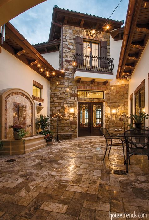 Globe lights over this home patio create a Tuscan-inspired getaway. See all our globe lights: http://www.lightsforalloccasions.com/c-245-globe-string-lights.aspx Asma Kat, Casa Country, Casas The Sims 4, Tuscan Inspired, Tuscan Design, Tuscan House, Spanish Style Homes, Spanish House, Mediterranean Homes