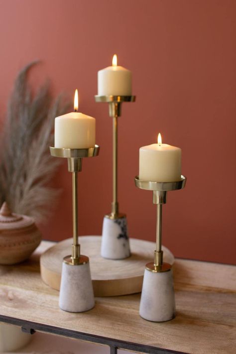 PRICES MAY VARY. Three is company with this set of brass and marble candleholders. The elevated design means you can place these with your other candle holders for a layered look or let them stand alone above it all. FeaturesHolds Taper Or Pillar Candle Material: Iron, Marble Dimensions: 3.50"L x 3.50"W x 14.50"H Kalalou is a leading designer and supplier of the most unique, fun, and fascinating products to be found in the home accents, garden decor, and gift arenas. For over 30 years we have tr Taper Candle, Holder, Tall Candle, Manualidades, Modern Rustic Decor, Modern Candle Holders, Candle Decor, Pillar Candles, Marble Candle
