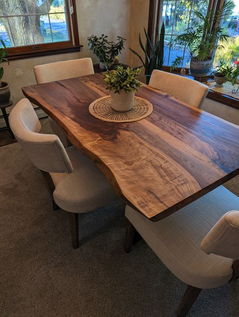 Live edge walnut table is single slab.Please contact us for single slab Live edge dining table, Solid american black walnut, Kitchen table, Live edge table, Table legs, Dining room table, Live edge walnut table DİMENSONS TABLE FOR 4 PEOPLE / 55''X27-30'' TABLE FOR 6 PEOPLE / 63''X 27-30'' -  75''X33-36'' TABLE FOR 8 PEOPLE / 79''X33-36''  -  87''X33-36 TABLE FOR 10 PEOPLE / 97''X38-41'' If you are looking for different sizes for length or width, please message us.Let us design a customized walnu Wood Slab Dining Table, Live Edge Dining Table, Live Edge Table Dining Rooms, Walnut Dining Table, Live Edge Table, Black Walnut Table, Walnut Table, Dining Table Height, Dining Table In Kitchen