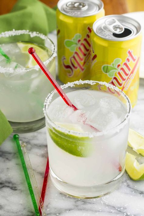 This easy paloma cocktail is made with Squirt grapefruit soda, tequila, lime juice, and a sprinkle of salt -- simple, inexpensive, and delicious! Margaritas, Margarita Recipes, Tequila, Tequila Cocktails, Tequila Drinks, Tequila Drinks Easy, Tequila Drinks Recipes, Cocktail Tequila, Tequila Recipe