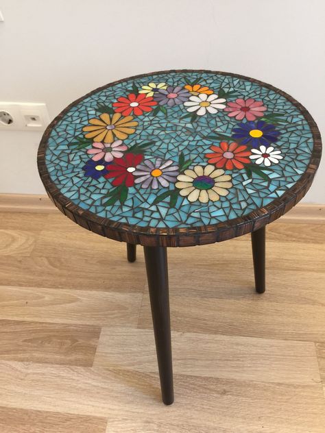 Glass mosaic coffee table.Floral mosaic.Vitreous glass tile mosaic on MDF base, with wooden legs. Tabletop has brackets installed for screw-in legs.A great gift for yourself or a loved one.Diameter 40 cm; height 50 cm. It will be packaged in a way that will not be damaged and will be sent in a wooden box. Mosaic Coffee Table, Mosaic Tile Table, Mosaic Glass, Mosaic Tile Art, Tiled Coffee Table, Coffee Table Flowers, Metal Table Legs, Wooden Table Top, Mosaic Tiles