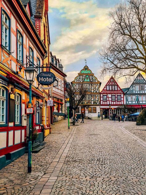 Cobbled streets with many ornately coloured buildings in Germany Instagram, Ideas, Germany Travel, Europe Travel, Europe, Cities In Germany, Visit Germany, Best Cities, Towns