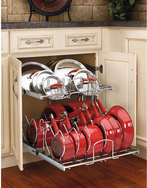 Organized kitchen storage cabinets! This is a really easy, great way to store store pots, pans, and lids. This pot rack has a place for every piece and it’s easy to put things back where they belong! One of the best kitchen cabinet organizers I've seen. #kitchen #storage #cabinets #organizers #pots #pans Storage Cabinets, Ikea, Kitchen Cabinet Organization, Diy Kitchen Storage, Kitchen Cabinet Storage, Pot And Pans Storage Ideas, Storage Solutions, Kitchen Remodel, Pan Storage