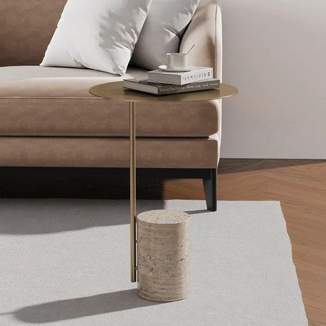 Introducing our exquisite Travertine Side Table, a true embodiment of elegance and style. Crafted with meticulous attention to detail, this captivating piece showcases a perfect fusion of luxurious materials and modern design. 【Study & Durable】The sleek and sturdy frame of this side table is expertly constructed using premium-grade gold stainless steel. Its lustrous frame in golden hue adds a touch of opulence and sophistication to any space, making it a stunning accent piece for both contemporary and classic interiors. The gold stainless steel frame not only enhances the table's visual appeal but also ensures exceptional durability and longevity.【Unique Design】The crowning jewel of this magnificent side table is its exquisite travertine tabletop. The travertine stone boasts a natural and Wood Table Design, Wood Accent Table, Furniture Side Tables, Modern Side Table Design, Modern Side Table, Side Table, Table Design, Side Table Decor, Unique Side Table