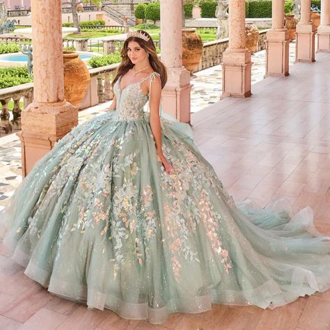 PR30157. Description: Get ready to shine and create unforgettable memories in this spectacular Quinceañera ball gown. With its sparkling sequins, delicate lace applique, and charming three-dimensional flowers, this stunning gown is simply breathtaking. A detachable bow and regal cathedral train add a touch of drama that is guaranteed to leave a lasting impression no one will forget! . Details: Fabric: Gli Quince Dresses, Prom, Quince Dress, Quinceanera Dresses, Quinceanera Themes Dresses, Quinceanera Collection, Quinceanera, Green Quinceanera Dresses, Prom Gown