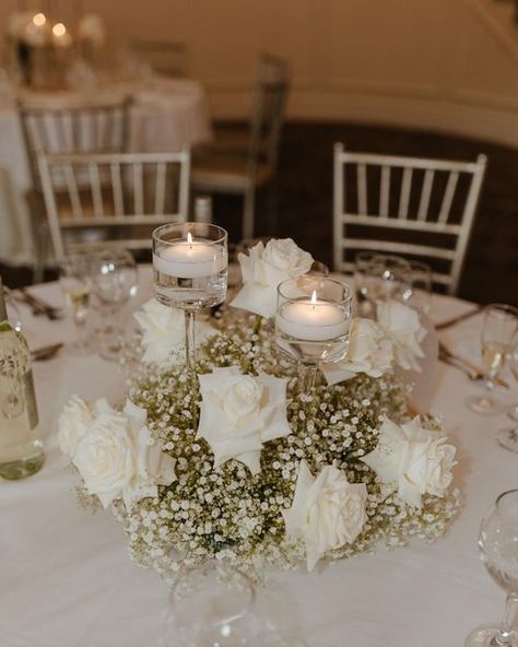Flawless Functions on Instagram: "Candles + Baby’s Breath + White roses is currently the most trending wedding flower combination. It is classic and timeless. Loved creating this look for @rachelrizzo 🤍 #wedding #weddingday #weddingvenue #weddingcenterpiece #candlecenterpiece #babysbreathwedding #whiterosewedding #weddingtablesetting #weddingtrends #weddinginspo #bride #bridal #ctbride #ctwedding #bridalshower" Natal, Wedding Decor, White Wedding Receptions, Table Centerpiece Wedding, Babys Breath Candle Centerpiece, Babies Breath Centerpiece, Round Table Wedding, Wedding Flower Centerpieces, Table Decor Wedding