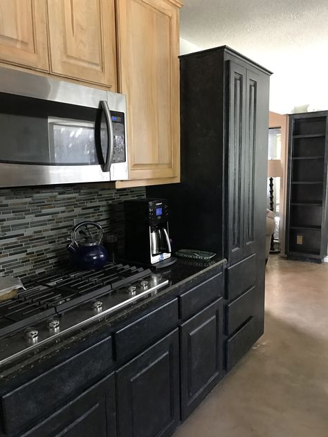 These black cabinets pair perfectly with the natural wood upper cabinets and stained concrete floor! Inspiration, Ideas, Decoration, Modern Farmhouse, Derby, Design, Black Lower Cabinets Wood Upper, Black Kitchen Cabinets, Dark Wood Kitchen Cabinets