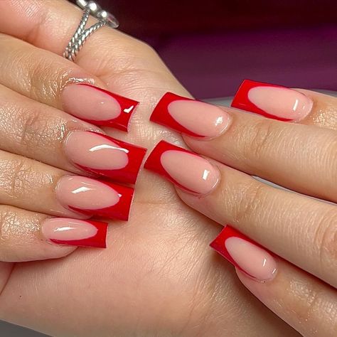 Below is our selection of the prettiest design ideas for red French tip nails - if you want to try a new twist on this manicure classic, we are sure you will lots of beautiful manicure ideas in this article. French tip nails | Red french tip nails | French manicure | Red nails | Red nail design | elegant nail designs | nail trends 2023 French Tip Nails, Red French Manicure, French Tip Acrylic Nails, Red Tip Nails, Classy Acrylic Nails, Long Acrylic Nails, Square Nails, Square Acrylic Nails, Red Acrylic Nails