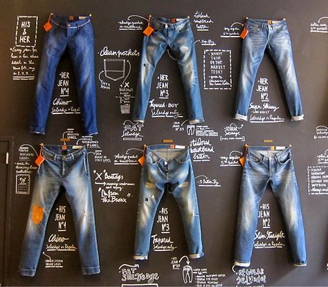 Love this wall display of denim and chalkboard paint at Good Genes store in Amsterdam. #retail #merchandising #jeans #chalkboard #fashion #wall #display