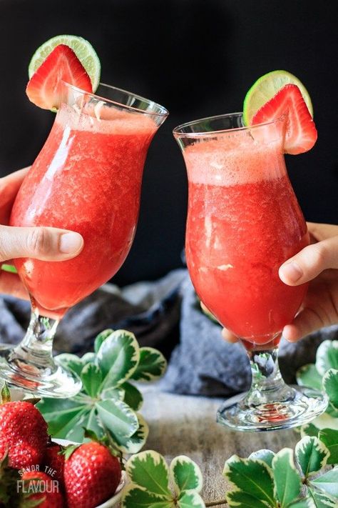 The Best Virgin Strawberry Daiquiri You’ll Ever Taste: this non alcoholic strawberry drink recipe is the ultimate frozen drink to enjoy this summer. It’s easy to make in your blender with just a few ingredients, and it’s sure to be a favorite treat for kids, teens, and party guests. | www.savortheflavour.com #strawberrydaiquiri #mocktail #nonalcoholic #summerdrinks #recipe Smoothies, Alcoholic Drinks, Strawberry Drink Recipes, Easy Alcoholic Drinks, Summer Drinks Nonalcoholic, Fruit Drinks, Summer Drink Recipes, Strawberry Daiquiri, Drink Recipes Nonalcoholic