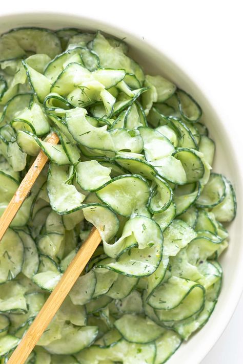 This refreshing Cucumber Yogurt Salad recipe features all the flavors of tzatziki in salad form. So if you love tzatziki, then you will love this creamy cucumber salad with all it's Greek and Mediterranean vibes. It’s loaded with crunchy cucumbers, creamy Greek yogurt, fresh dill, garlic and lemon. A quick and easy side dish that is SO GOOD! | www.mapleandmango.com Yemek, Eten, Mad, Koken, Kochen, Borden, Cuisine, Rezepte, Recetas