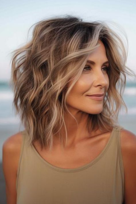 Tousled beach waves on medium hair are ideal for a casual, effortless look. This style is great if you want to add texture and volume to your hair. Click here to check out more best hairstyles for older women trending right now. Short Hair Styles, Long Hair Styles, Hair Trends, Cortes De Cabello Corto, Haar, Gaya Rambut, Bob, Hairdo, Hair Cuts