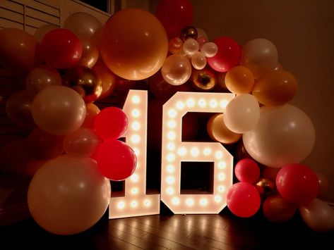 Sweet 16's are a big milestone and you want to make sure your event is picture perfect. This home party was lit up with our rentable marquee letters and around was a balloon arch with the colours of the clients choice.  #sweet16 #birthdaypartyidead #homepartydecor #pinkwhiteandgold #balloongarland Halloween, 16th Birthday, Sweet 16 Decorations, Sweet 16 Balloon Decorations, Black And Gold Party Decorations, 16th Birthday Party, Party Photo Booth, Gold Party Decorations, Party Decorations