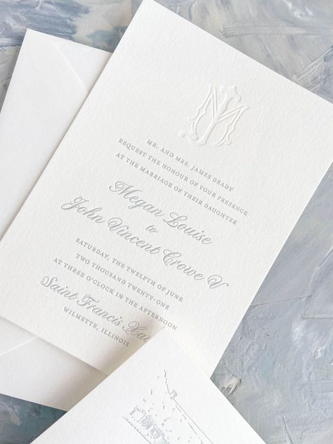 Cloud light blue letterpress wedding invitations with custom monogram printed in blind letterpress.