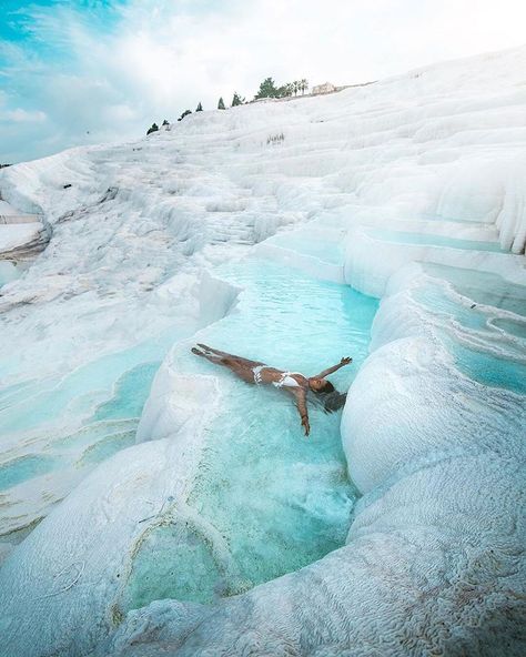 Pamukkale in western Turkey, known for the mineral-rich thermal waters flowing down white travertine terraces on a nearby hillside. Photo… Places, Travel, Nature, Adventure, Lugares, Wonderful Places, Voyage, Beautiful Places, Amazing