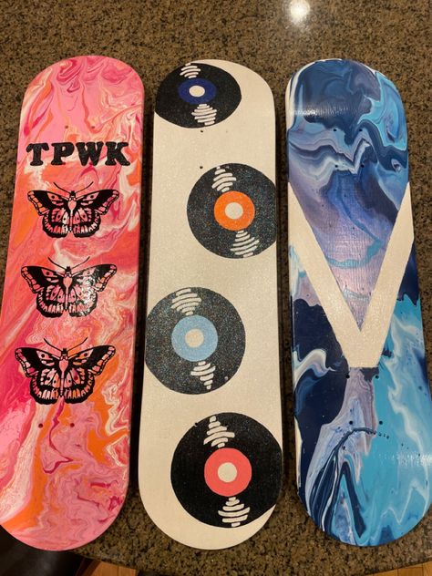 Skateboard deck painting with pour paint. #skateboard #painting #crafts #diy #harrystyles #villanova #music #decor #tpwk #project #art Design, Skateboard, Painted Skateboard, Skateboard Deck Art, Skateboard Art, Skate Board, Skateboard Art Design, Skateboard Design, Skateboard Decks