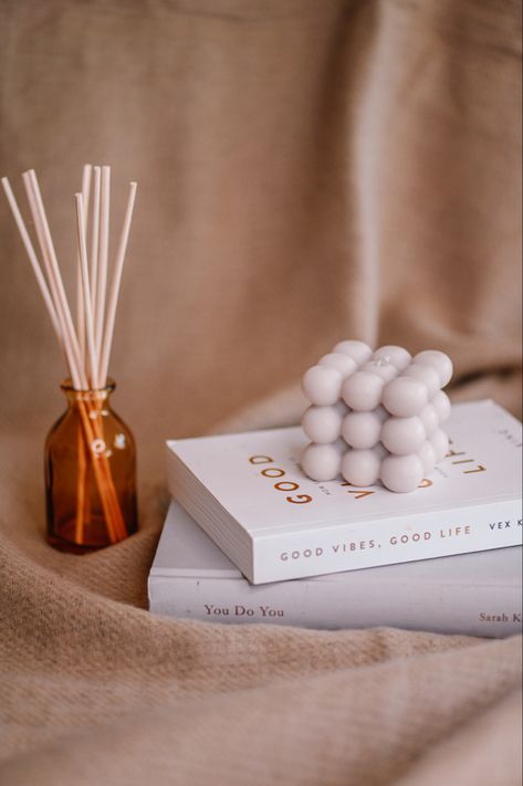 Books, diffusers, bubble candle. #photoshoot #photoshootideas #photoinspiration #candles #interiordecor #interiordesigner #interiorstyling #decorideas #contentmarketingtips Boho, Instagram, Decoration, Eco Friendly Candles, Scented Candles, Candle Store, Candles Photography, Candle Photography Ideas, Aesthetic Candles