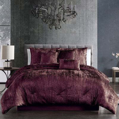 The Taos collection includes 2 coordinating pieces of pure luxurious glam. This big, bold look of crinkle charcoal velvet, quilted shams, and matching decorative pillows says "Go big or go home". This versatile styling makes Taos the perfect choice for any décor from modern to traditional simple elegance. Everything is included for an instant transformation. Color: Plum, Size: Queen Comforter + 5 Standard Shams | Riverbrook Home Comforter Set Polyester / Polyfill / Microfiber / Velvet in Indigo, Plum Bedding, King Size Bed Designs, Simple Bed Designs, Velvet Comforter, Go Big Or Go Home, Bunk Bed Designs, Bed Design Modern, Elegant Bedding, Simple Bed