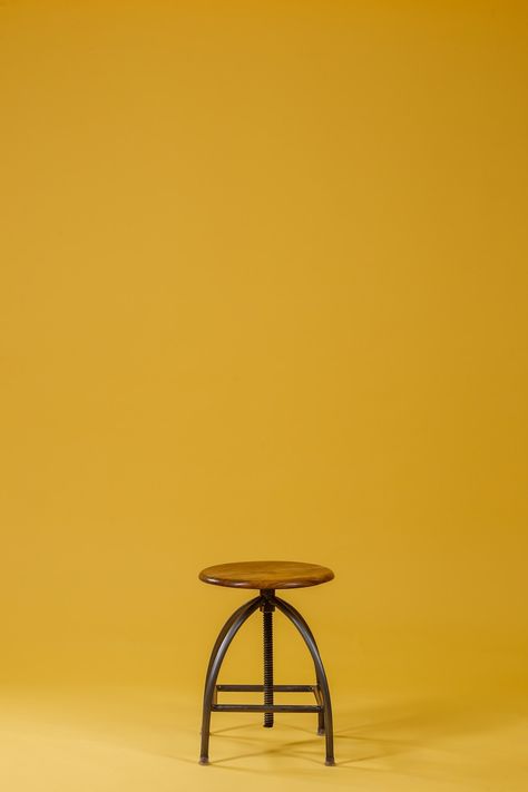 round brown wooden top and black base chair on yellow background photo – Free Furniture Image on Unsplash Studio, Studio Backdrops Backgrounds, Studio Background Images, Backdrops Backgrounds, Blurred Background Photography, Light Background Images, Blur Background Photography, Best Photo Background, Blur Photo Background
