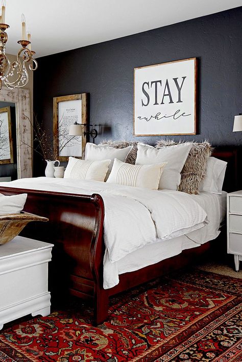 Whether you're working with a hand-me-down family heirloom or a vintage piece you scored for a bargain, decorating with wood furniture is all about achieving a balance. Use these tips on how to decorate with wood furniture to style old pieces with an updated look. #howtodecoratewithwoodfurniture #thrifted #fleamarketfinds #bedroomdecor #bhg Home Décor, Sleigh Bed Master Bedroom, Master Bedroom Furniture, Master Bedroom Ideas Dark Furniture, Master Bedrooms Decor, Master Bedroom Makeover, Wood Bedroom Furniture, Wooden Bedroom, Wood Bedroom Decor