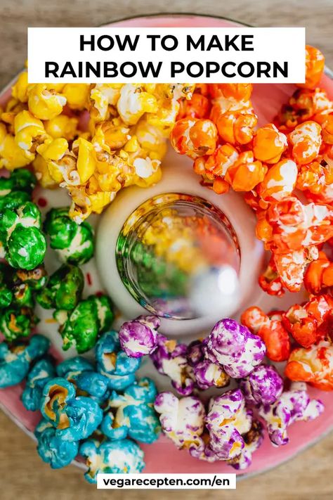 This rainbow popcorn recipe is fun and easy to make! Perfect as a popcorn treat, for a birthday party, for an evening on the couch, for Pride, or just to make your day more colorful. You really make everyone happy with this unique rainbow popcorn | How to make rainbow popcorn | diy rainbow popcorn recipe | Rainbow food coloring | Sweet popcorn recipes | Homemade popcorn | Colored popcorn #popcorn #rainbowpopcorn