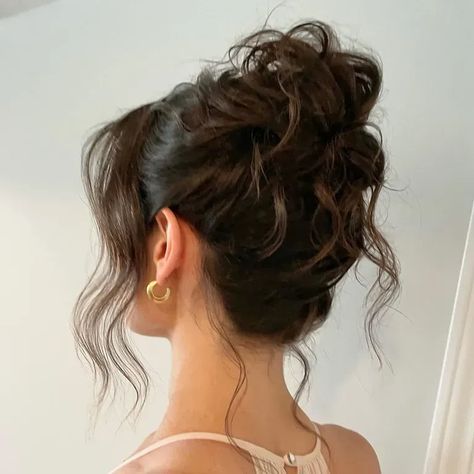 Messy wavy bun wedding hairstyle