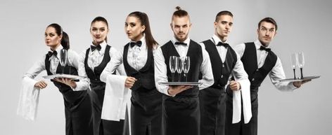 From the most afforable restaurants to expensive ones like Peter Luger, the general uniform for waitstaff consists of button up shirts and slacks, typically of black and white color. Design, Mariage, Uniform, Waiter Uniform Design, Bartender, Uniform Design, Butler Outfit, Black And White Colour, Gala Events