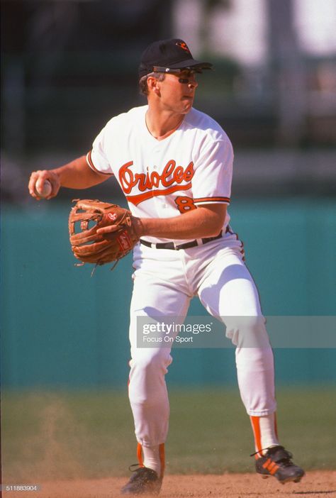 Cal Ripken Jr. #8 of the Baltimore Orioles looks to throw to first... News Photo - Getty Images Baltimore Orioles, Cal Ripken Jr., Sports Jersey, Junior, Baltimore, Baseball Games, League, Photo, Cal