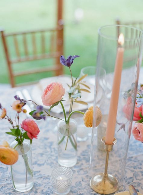 Delicate bud vases with sunset inspired flowers. Paired with a blue floral linen, gold candle holders, and blush taper candlesticks. Floral Design: Hana Floral Design @hanafloral Photographer: Carrie Patterson https://www.carriepattersonphotography.com Decoration, Bud Vase Centerpiece, Bud Vases Wedding, Bud Vases Flowers, Bud Vases, Candle Wedding Centerpieces, Taper Candles Wedding, Flower Centerpieces, Wedding Candles Table