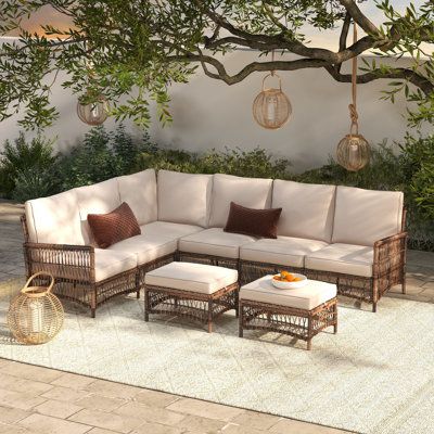 The perfect addition to any patio, deck, or sunroom, this all-weather wicker 6-person sectional seating set is made from durable, weather-resistant wicker and features plush, comfortable cushions. The set includes a sectional sofa and two ottomans. The modular design allows you to arrange the pieces in a variety of configurations to suit your needs. | Ebern Designs Direnzo 98" Wide Outdoor 6 - Person Outdoor Wicker L-Shaped Patio Sectional w / Cushions Wicker / Rattan in Brown | 32.7 H x 98 W x Design, Outdoor Sectional Sofa, Outdoor Sofa, Outdoor Seating, Wicker Patio Furniture, Outdoor Loveseat, Outdoor Couch, Sectional Patio Furniture, Outdoor Sectional