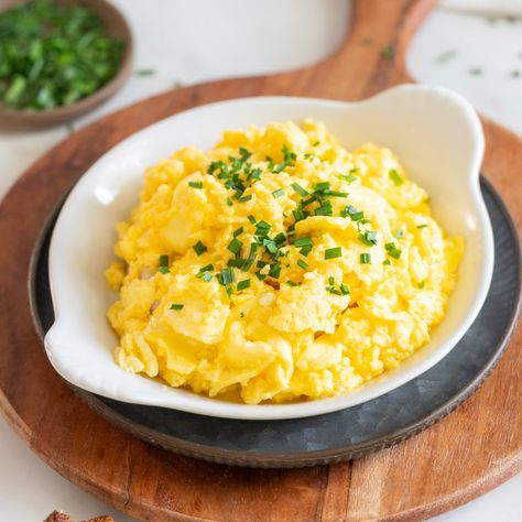 This fluffy scrambled eggs with cheese recipe is a simple way to cook a scrumptious breakfast even on busy weekday mornings. This easy recipe teaches beginner cooks how to make the best scrambled eggs in just a few minutes.  It is no secret I love making eggs for both breakfast and dinner. But this is the egg recipe I make... The post Scrambled Eggs with Cheese appeared first on Peel with Zeal. Sandwiches, Studio, Brunch, Bacon, Scrambled Eggs, Muffin, Scrambled Eggs With Cheese, Cheese Scrambled Eggs, Scrambled Eggs Recipe