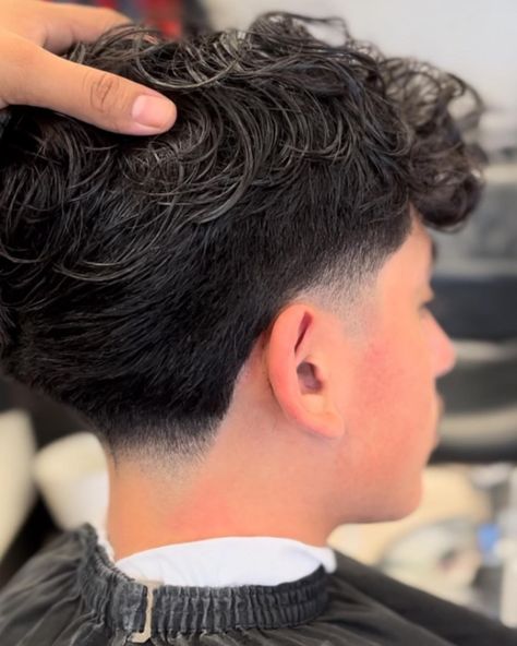 We suggest a low taper fade, a super simple yet impactful hairstyle if you have some edges that need trimming, or want to incorporate a fun, neat twist to your look. Click the article link for more photos and inspiration like this // Photo Credit: Instagram @eleganzebeautysalon // #longhairlowtaperfade #lowtaperfade #lowtaperfadehaircut #menshair #menshaircuts #shortlowtaperfade Mens Haircuts Fade, Men Haircut Curly Hair, Low Taper Fade Haircut, Haircuts For Men, Fade Haircut Curly Hair, Tapered Haircut, Low Taper Haircut, Low Taper Fade, Taper Fade Haircut