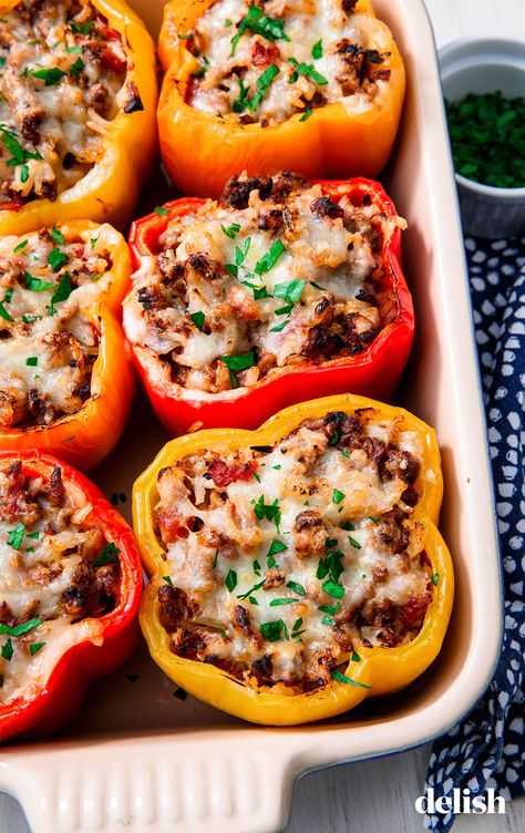 Classic Stuffed Peppers are the fast family dinner you need. Get the recipe at Delish.com. #recipe #easy #easyrecipes #delish #stuffedpeppers #peppers #dinner #dinnerrecipes #groundbeef #cheese #healthy #lowcarb #lowcarbrecipes #family Slow Cooker, Dinner Recipes, Grilling, Pasta, Entrées, Cuisine, Entrees, Gourmet, Dinner