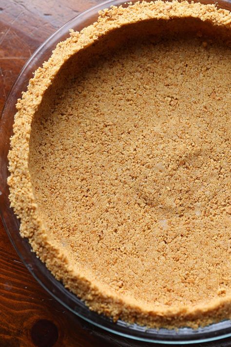 This easy graham cracker pie crust is buttery, flavored with sweet ground cinnamon, and the perfect base for your favorite pie recipe! Pie, Desserts, Dessert, Graham Cracker Crust Pie, Graham Cracker Crust Pie Recipes, Homemade Graham Cracker Crust, Graham Cracker Recipes, Graham Wafer Crust, Homemade Graham Crackers