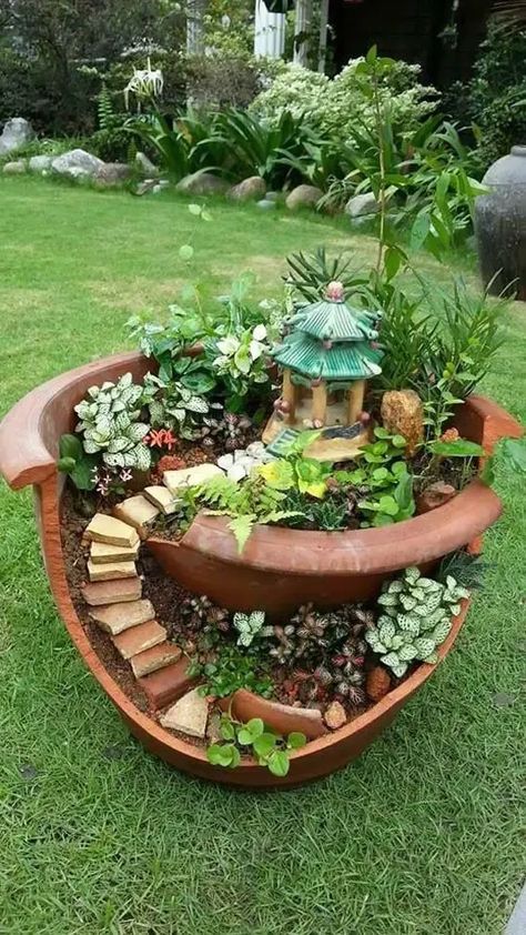 DIY Fairy Garden From Flower Pot #fairygarden #diy #decorhomeideas Check this: 👉👉http://gardening.hostio.me/homeI'm Alvin, a gardening enthusiast whose world revolves around lush greens and blossoming colors. From dawn till dusk, you'll find them nurturing each plant with unwavering affection. With a keen understanding of soil and seasons, Alvin garden thrives, a testament to their boundless passion and dedication Front Garden Landscaping, Garden Design, Landscaping Ideas, Garden Landscaping, Yard Landscaping, Garden Pots, Garden Projects, Front Yard Landscaping, Front Yard