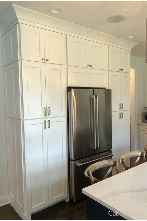 With crown molding and stacked cabinets, these homeowners transformed their basic refrigerator into a swoon-worthy built-in. Ideas, Kitchen Cabinet Molding, Built In Shelves Living Room, Cabinet Molding, Shaker Style Kitchens, Kitchen Cabinet Styles, Kitchen Cabinet Crown Molding, Kitchen Cabinet Design, Kitchen Cabinetry